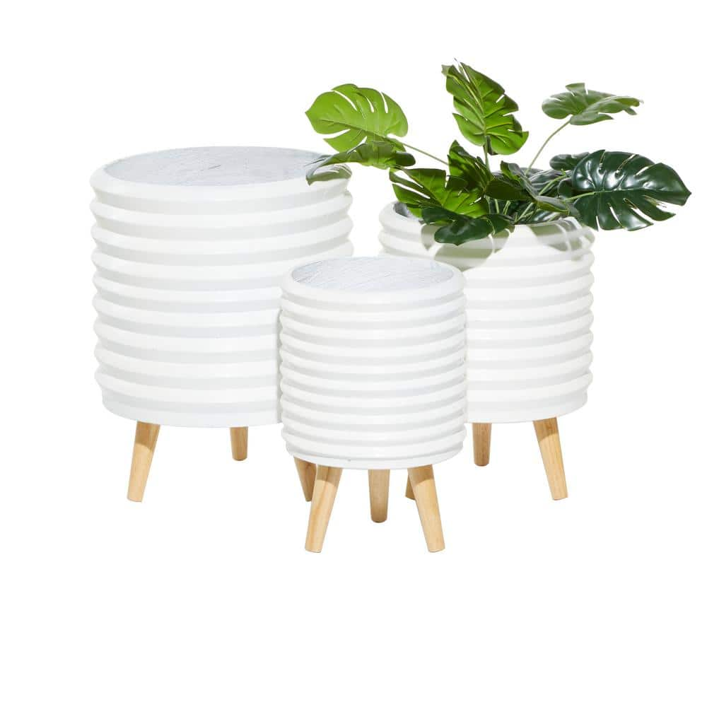 CosmoLiving by Cosmopolitan 14in. Medium White Magnesium Oxide Indoor  Outdoor Planter with Wood Legs (3- Pack) 46523 - The Home Depot