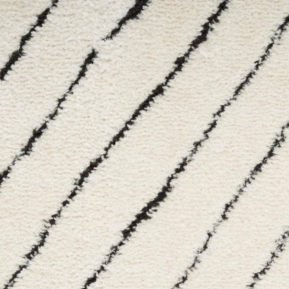 Ivory Black Abstract 8' x 10' Synthetic Area Rug