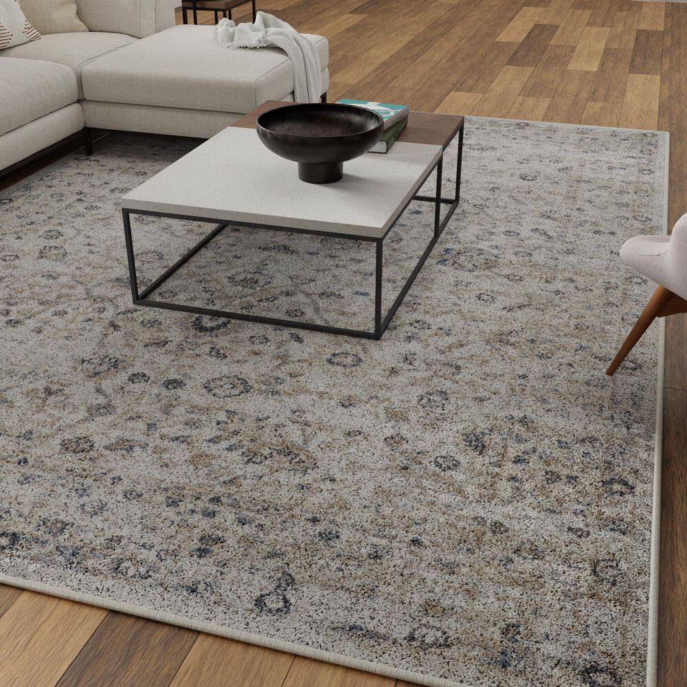 Blue Blossom Border 9' x 12' Synthetic Easy-Care Area Rug