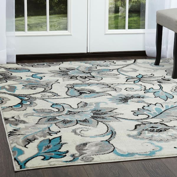 Boho Odesa Ivory/Aqua 7 ft. x 10 ft. Floral Area Rug