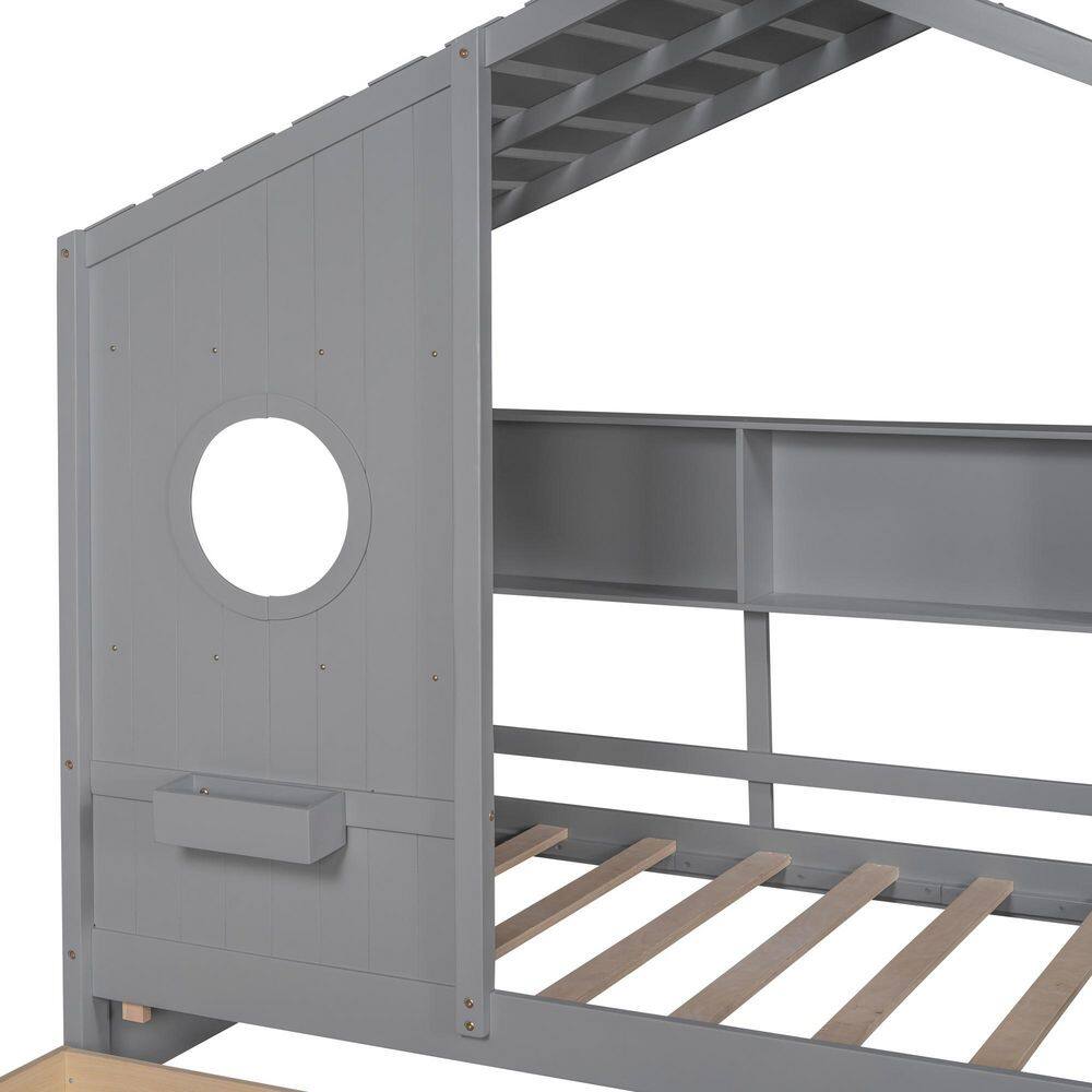 Close-up of the gray side wall with circular cutout and small shelf.