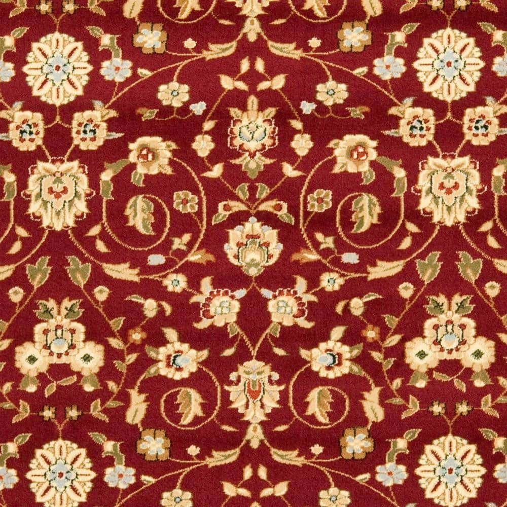 Red and Ivory Floral 9' x 12' Synthetic Area Rug