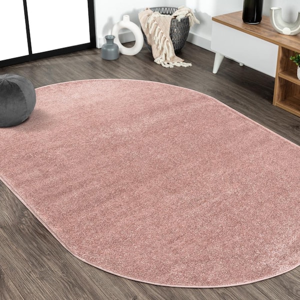 JONATHAN Y Haze Solid Low-Pile Pink 6 ft. x 9 ft. Oval Area Rug