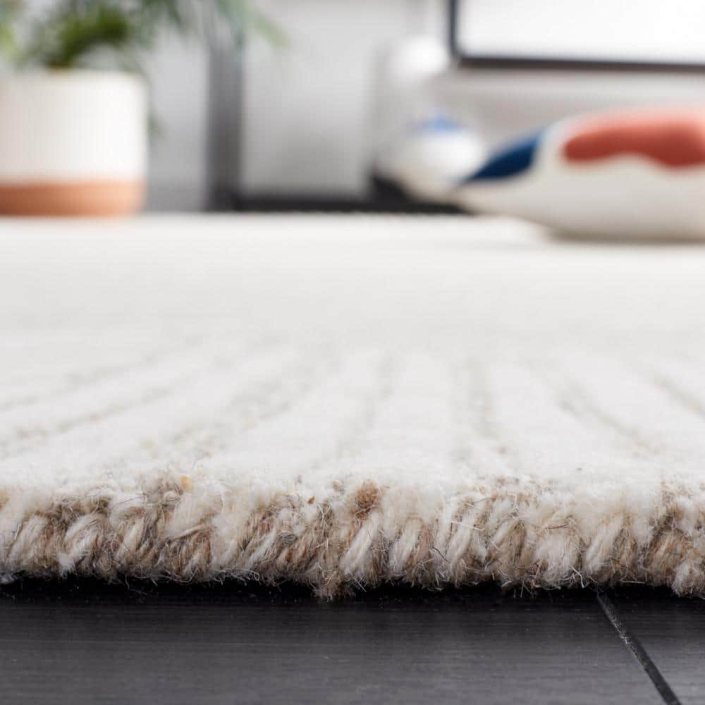Natural Ivory Handmade Wool Tufted Abstract Rug 5' x 8'