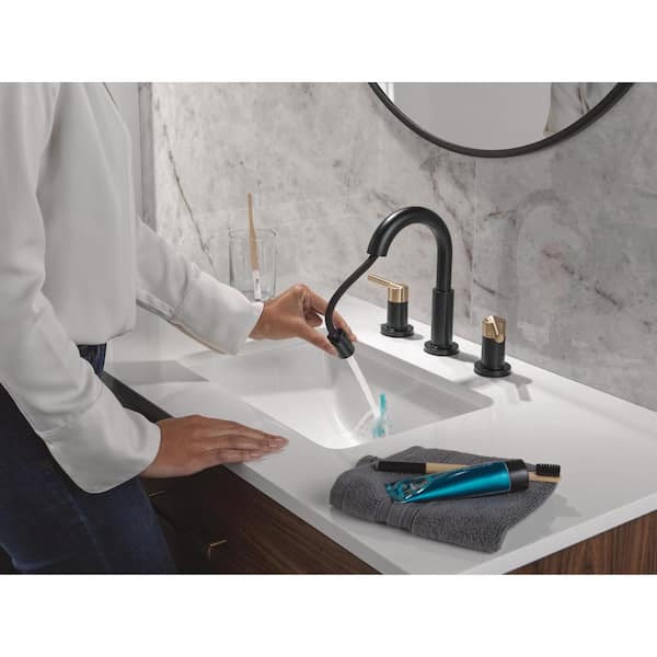 Nicoli Pull-Down Spout 8 in. Widespread Double Handle Bathroom Faucet Drain Included in Matte Black/Champagne Bronze