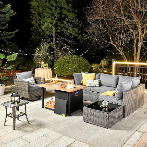 Sanibel Gray 8-Piece Wicker Patio Conversation Sofa Set with a Swivel Chair, a Storage Fire Pit and Dark Gray Cushions
