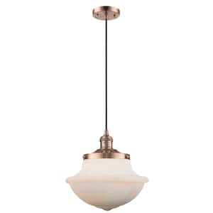 Oxford 1-Light Antique Copper Schoolhouse Pendant Light with Matte White Glass Shade