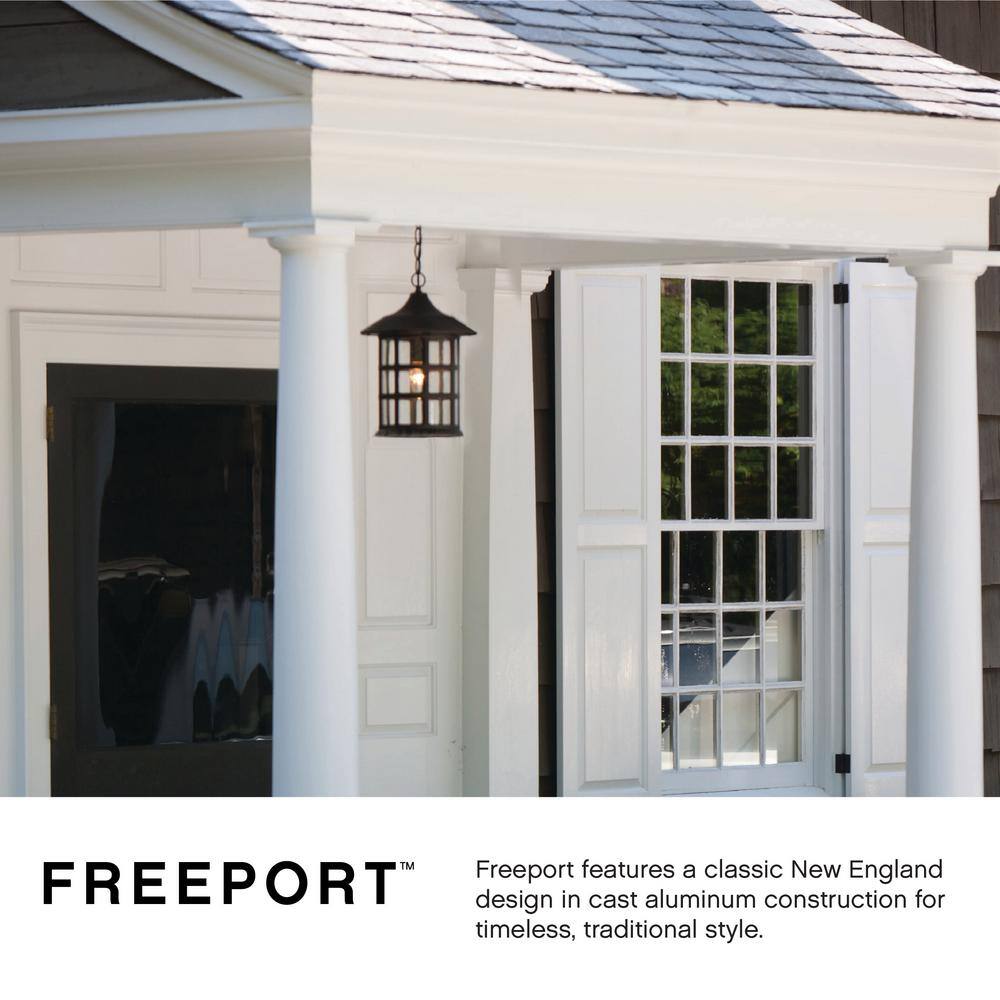 Freeport Classic Bronze Outdoor Wall Sconce with Clear Seedy Glass