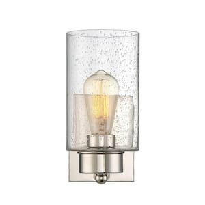 Meridian 5 in. W x 10.5 in. H 1-Light Polished Nickel Wall Sconce with Clear Seeded Glass Shade