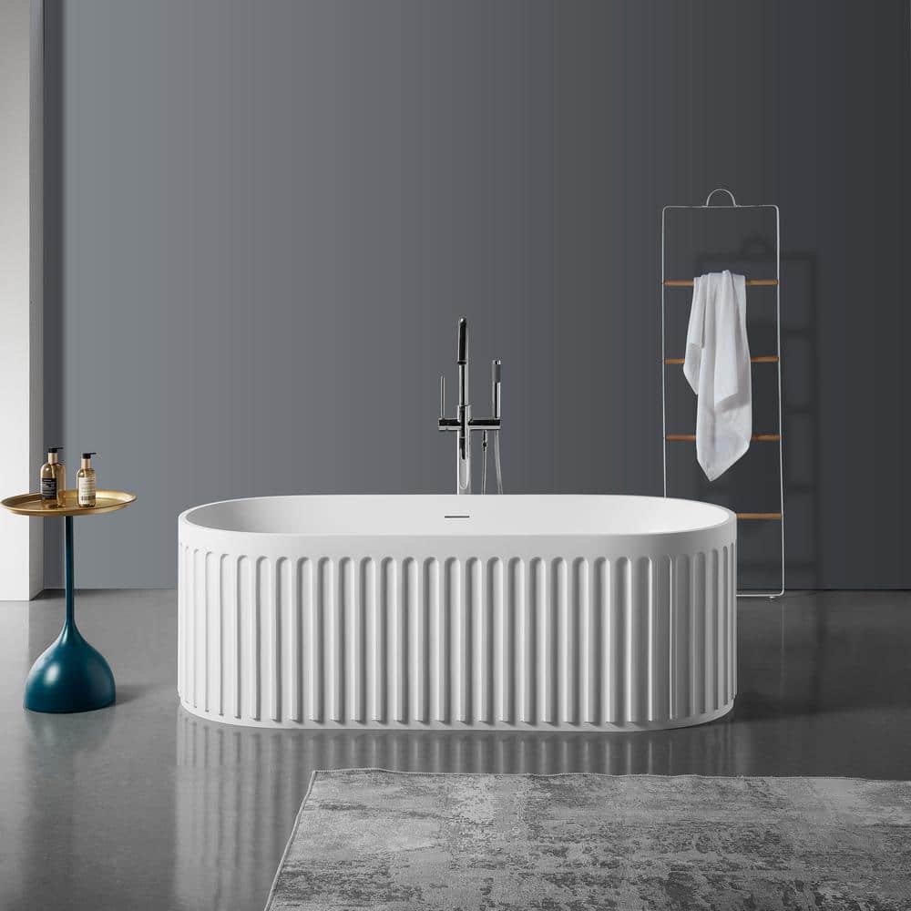Zeus & Ruta Stone Resin 67 in. x 29.5 in. Soaking Bathtub Center Drain ...