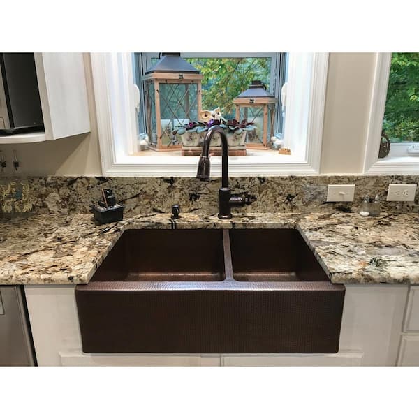 https://images.thdstatic.com/productImages/cbe69a55-eacb-4b10-aed4-42539210be60/svn/oil-rubbed-bronze-premier-copper-products-farmhouse-kitchen-sinks-ksp2-ka60db33229-64_600.jpg