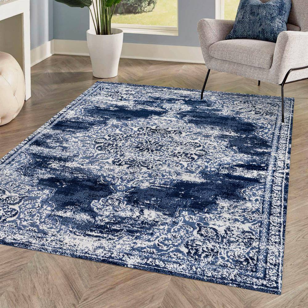 Navy and Ivory Synthetic Medallion 4' x 6' Area Rug