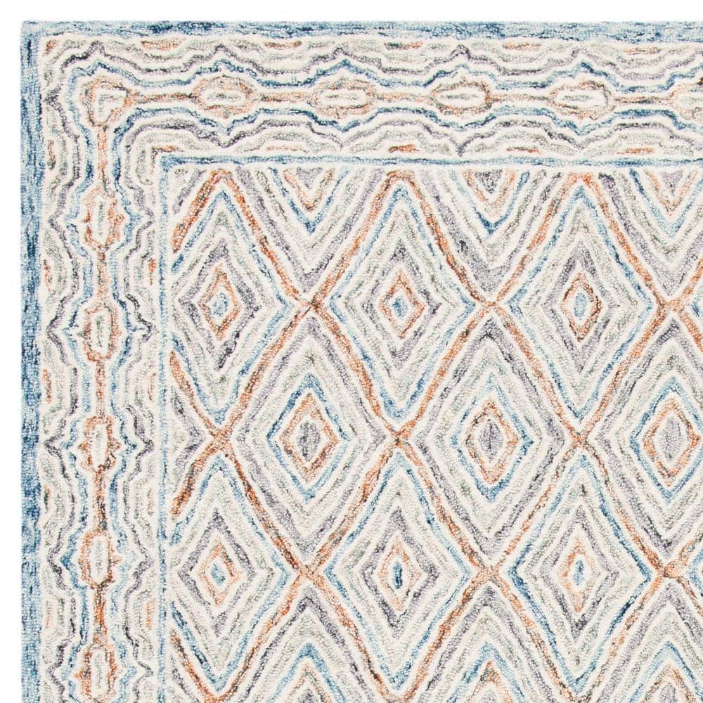 Capri Blue Hand Tufted Wool 4' x 6' Area Rug