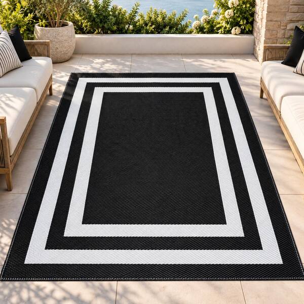 Paris Black and White 6 ft. x 9 ft. Folded Reversible Recycled Plastic Indoor/Outdoor Area Rug-Floor Mat