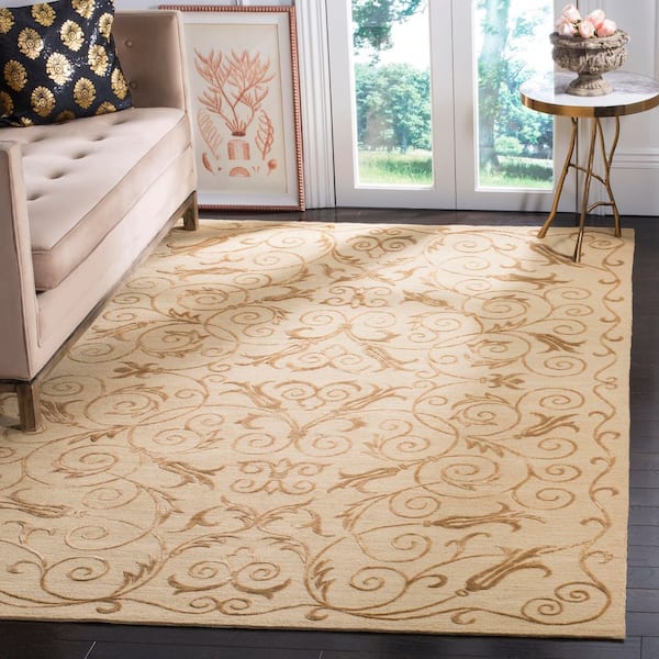 Tibetan 6 ft. x 9 ft. Light Gold Ornate Swirl Area Rug