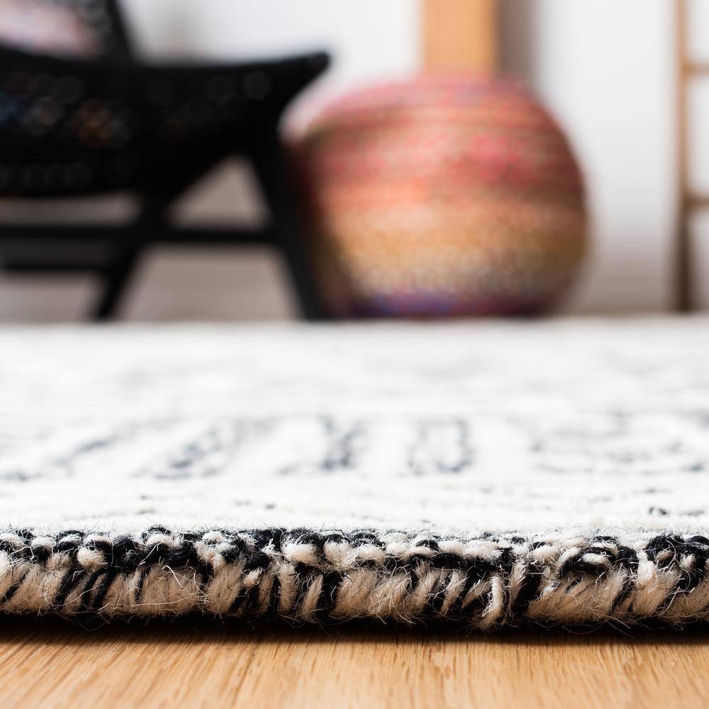 Handmade Black and Ivory Wool Abstract 9' x 12' Area Rug