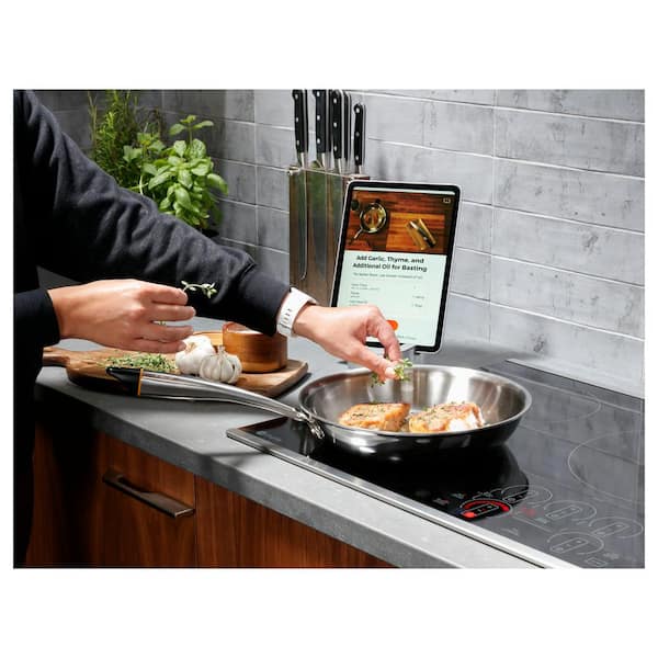 https://images.thdstatic.com/productImages/cbf5c89f-95e7-488f-b63c-7b3d0296c76a/svn/stainless-steel-ge-profile-induction-cooktops-php9036stss-76_600.jpg