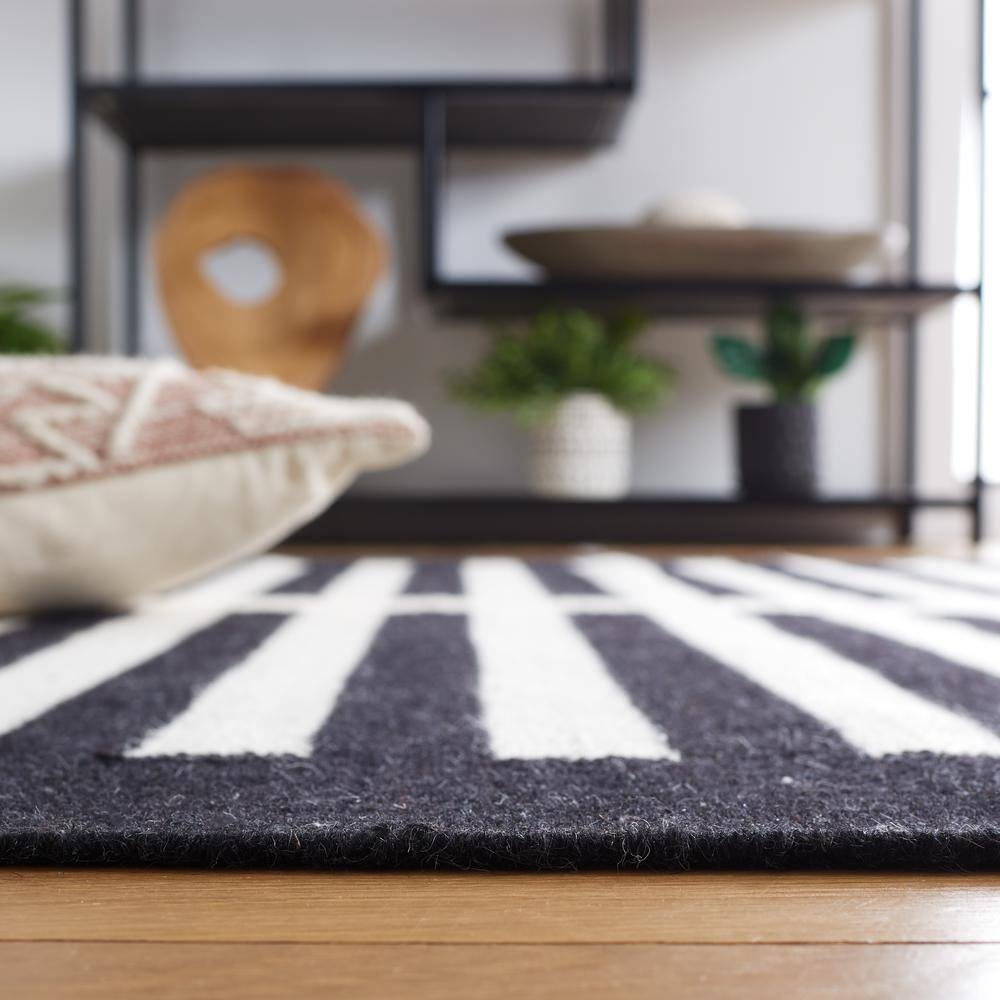 Handmade Black and Ivory Wool Striped 4' x 6' Area Rug