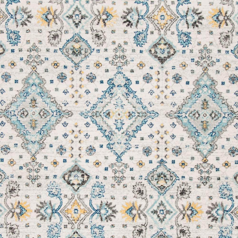 Ivory and Light Blue Floral Synthetic 9' x 12' Rectangular Area Rug