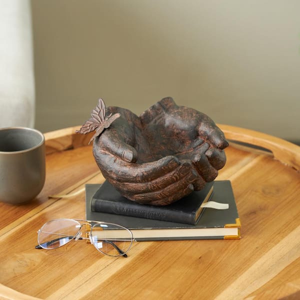 Litton Lane Dark Brown Resin Open Hands Sculpture with Butterfly and Copper Accents