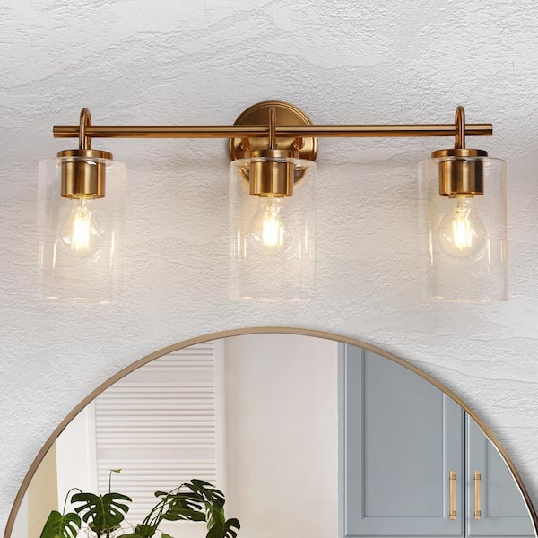 LNC Modern Plated Brass Bathroom Vanity Light 22 in. 3-Light Classic Decorative Wall Sconce with Cylinder Clear Glass Shades