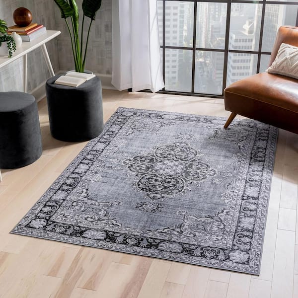 https://images.thdstatic.com/productImages/cc2bef0e-11d9-404d-b1bb-81d16a8cdc19/svn/grey-well-woven-area-rugs-nil-07-4-31_600.jpg