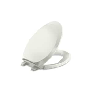 French Curve Elongated Closed Front Toilet Seat in Dune