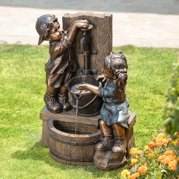 Glitzhome 25.5 in. H Polyresin Boy and Girl Sculptural Outdoor Fountain With Pump and LED Lights