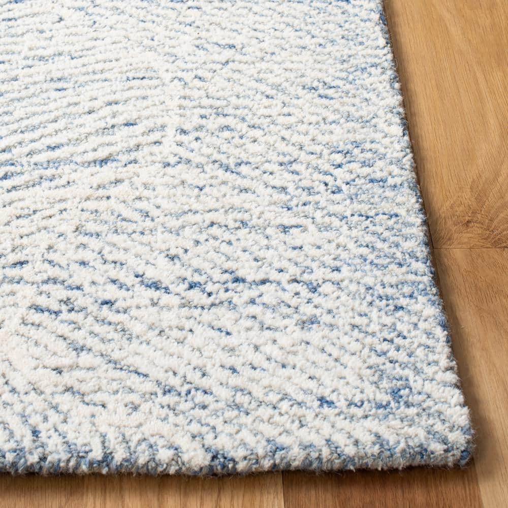 Blue and Ivory Floral Hand-Tufted Wool Area Rug, 5' x 8'