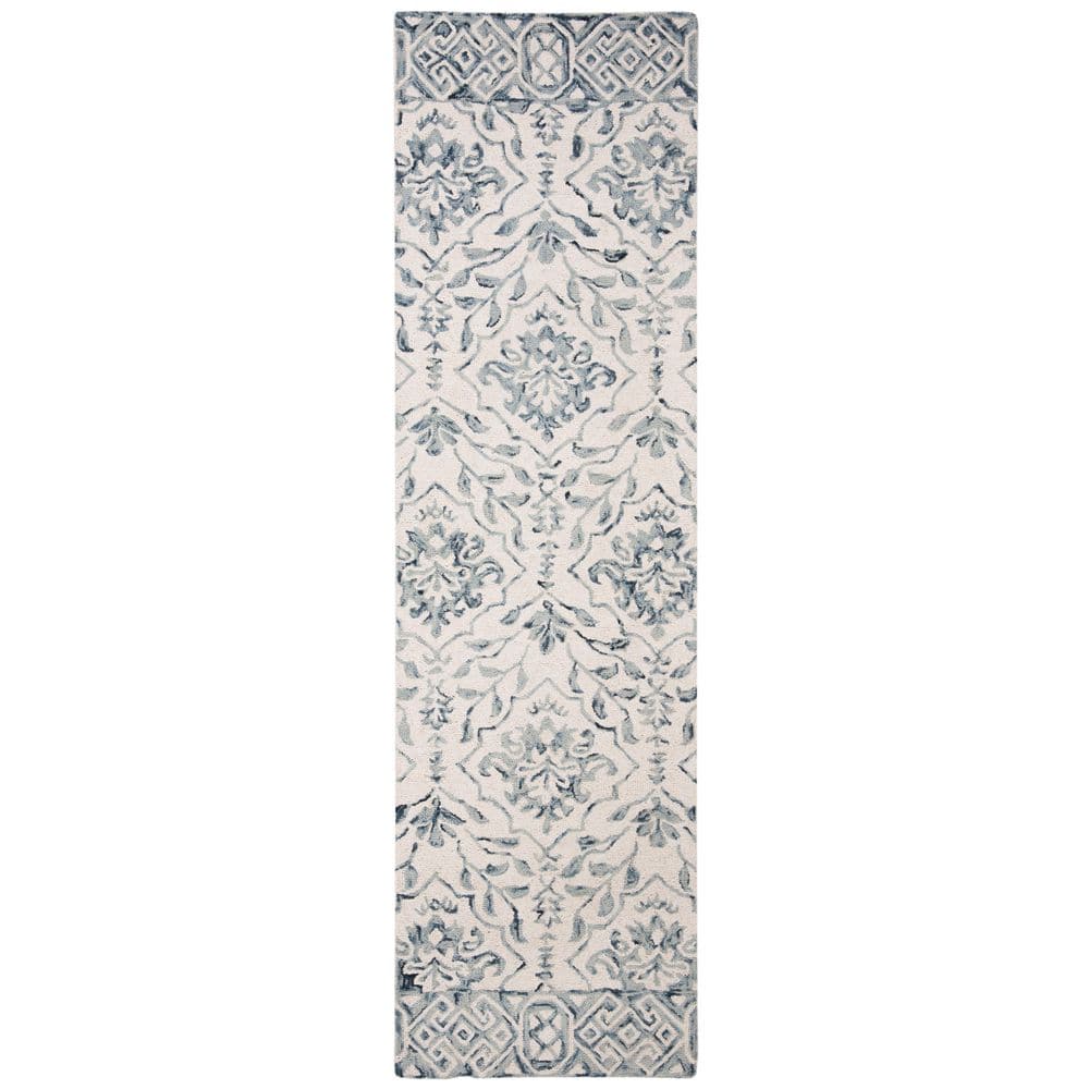 Ivory and Blue Geometric Tufted Wool Runner Rug 27"x12"