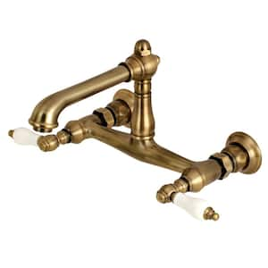 English Country 2-Handle Wall Mount Bathroom Faucet in Antique Brass