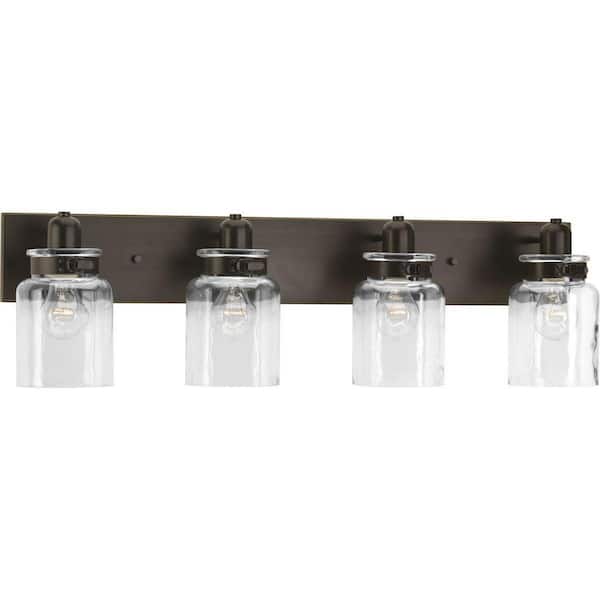 Calhoun Collection 30-1/4 in. 4-Light Antique Bronze Clear Glass Farmhouse Urban Industrial Bathroom Vanity Light