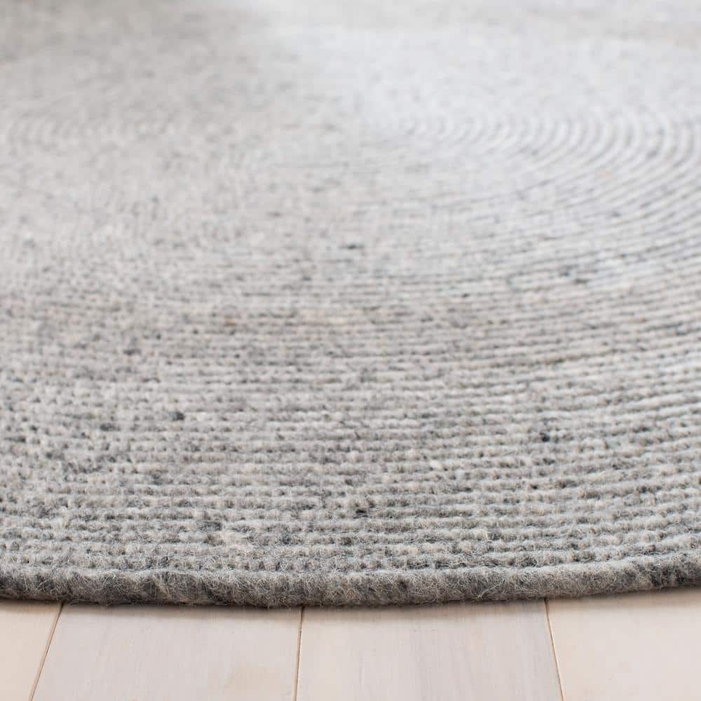 Handmade Light Gray Braided Wool Round Area Rug