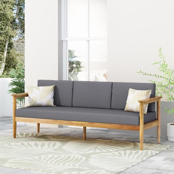 Noble House Daley Wood Outdoor Patio Counch with Dark Gray Cushions