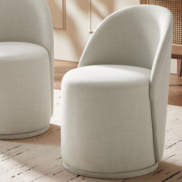Clester Beige Polyester Swivel Dining Chair