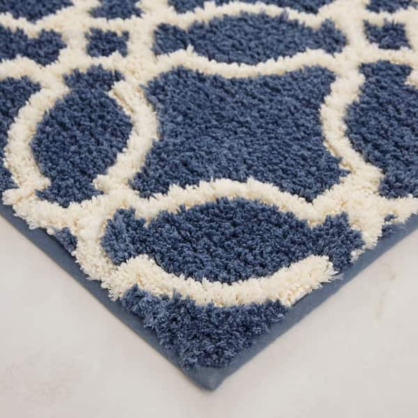 https://images.thdstatic.com/productImages/ccad37fa-458d-4daa-ace2-6e115b8e5f25/svn/navy-mohawk-home-bathroom-rugs-bath-mats-091317-77_600.jpg