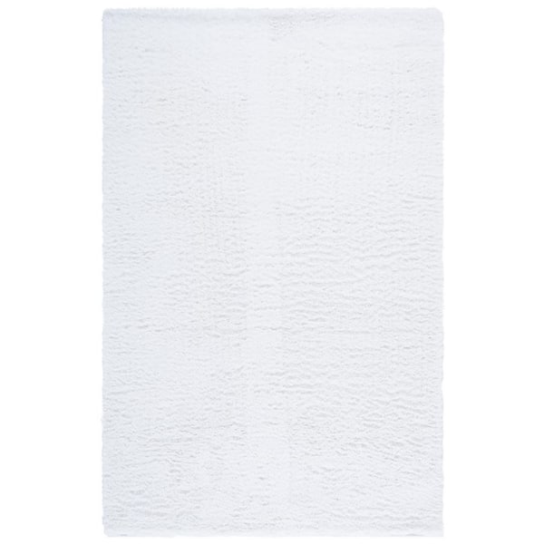 Toronto Shag 6 ft. x 9 ft. Ivory Solid Color Area Rug