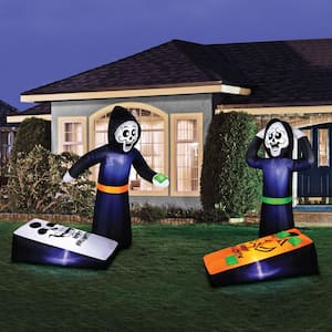 60 in. H x 35 in. W x 60 in. L Halloween Inflatable Reapers Playing Corn Hole