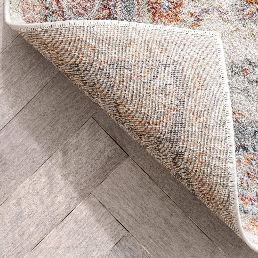 Ivory Floral Synthetic Reversible 5' x 7' Area Rug