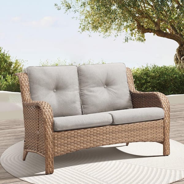 Yellow PE Wicker Outdoor Loveseat with Beige Cushions and Curved Armrests