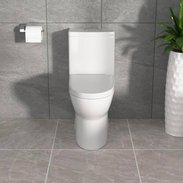 12 in. Rough-In 1-Piece 0.8/1.2 GPF Dual Flush Round Toilet in White, Seat Included 12 in. Rough-In 1-Piece 0.8/1.2 GPF Dual Flush Round Toilet in White, Seat Included