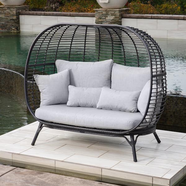 Black wicker store outdoor loveseat