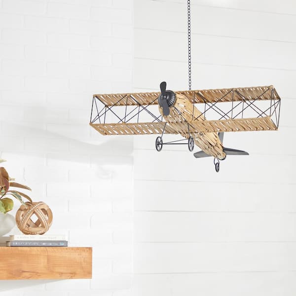 Litton Lane 30.75 in. x 28 in. x 10 in. Natural Brown PVC Plastic and Metal Hanging Plane Sculpture