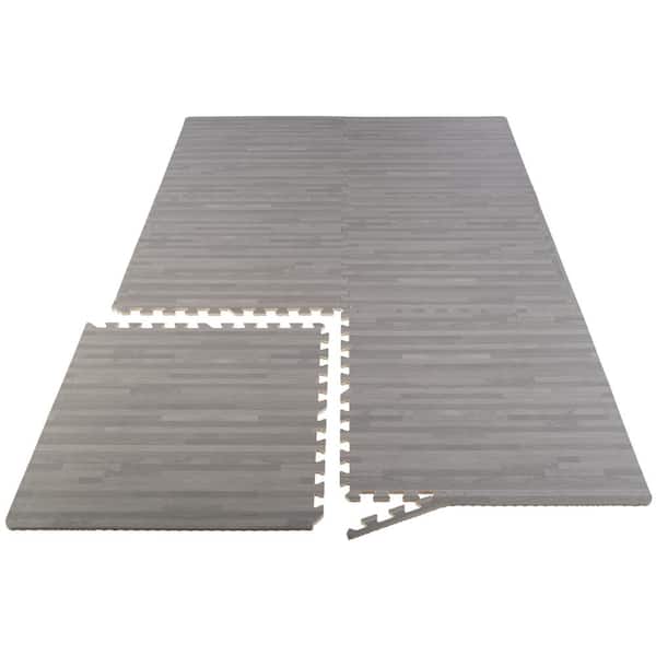 https://images.thdstatic.com/productImages/ccfd9541-1244-4e81-be51-9139d2da2887/svn/gray-woodgrain-stalwart-gym-floor-tiles-75-6406-a0_600.jpg