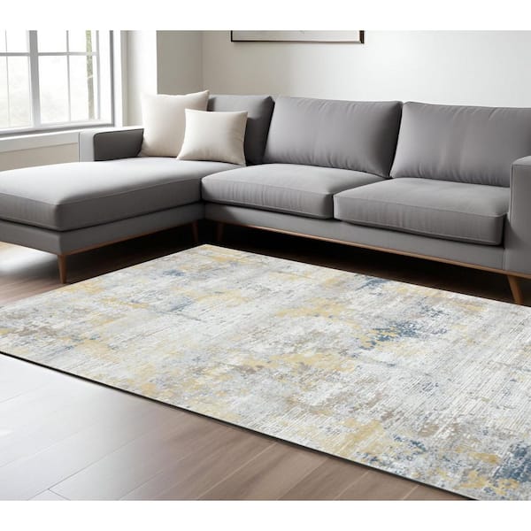 10 ft. x 14 ft. Gold Ivory And Blue Abstract Area Rug
