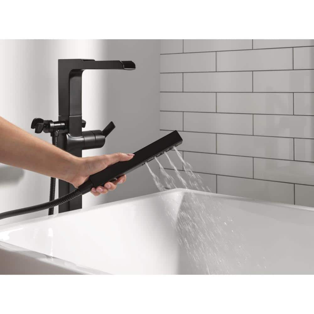 Sleek Stainless Steel Floor Mounted Faucet with Handshower