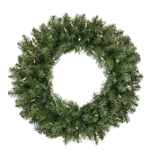 24 in. Green Pre-Lit Rockwood Pine Artificial Christmas Wreath with 50 Clear Lights