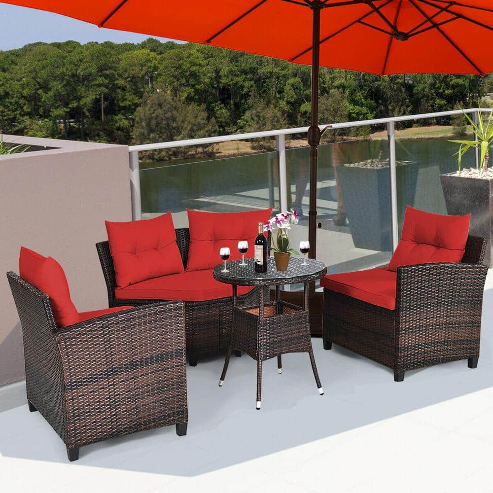 4-Piece Wicker Patio Conversation Set with Red Cushions and Glass Tabletop
