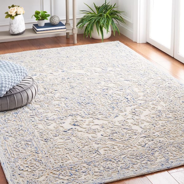 https://images.thdstatic.com/productImages/cd19a26a-f159-4ee5-b87f-08839c1c1aac/svn/ivory-blue-safavieh-area-rugs-msr3532m-5-e1_600.jpg