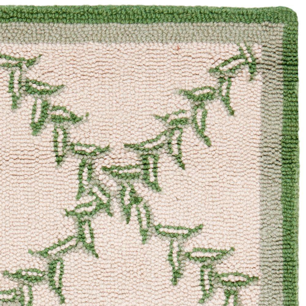 Handmade Ivory and Light Green Floral Wool Accent Rug, 2'6" x 4'
